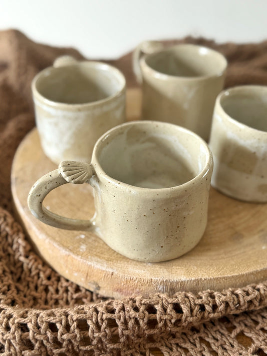 Tasse coquillage sable
